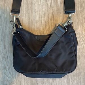 Black nylon shoulder bag with crossbody strap